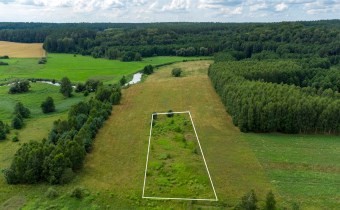 Działka budowlana Smolajny las z obu stron rzeka w