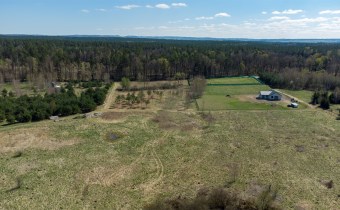 Działka Gierłoż 1718 m² z zaznaczonymi granicami, 