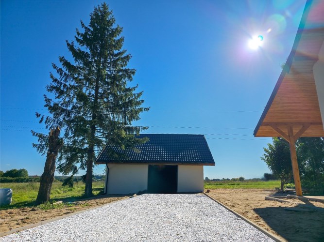 Garaż murowany 50 m2 przy domu w Bartach – żwirowy